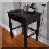 F42. Black painted telephone stand. 29”h x 17”w x 13”d - $24 